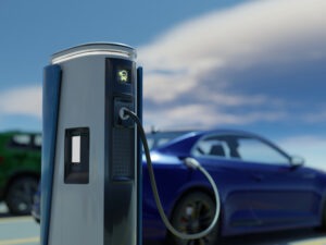 A blue electric car recharging in a European city city