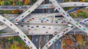 Aerial view of freeway in the USA with lots of traffic.