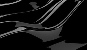 oblique, abstract close-up image of a black car